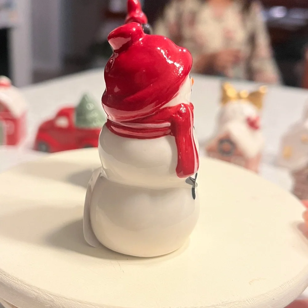 Ceramic Snowman Figurines with Red and Black Accents